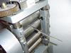 Rolling the Strips of Platinum-Enhanced Silver and 14k Palladium White Gold